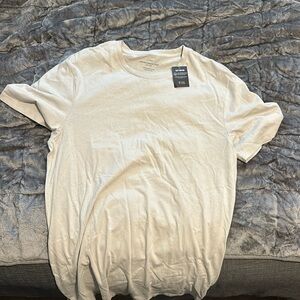 Brand new organic long line T-shirt, size medium.